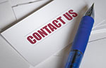 Contact Us sheet and pen